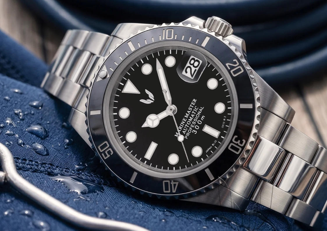 Image of watch hands and an automatic watch