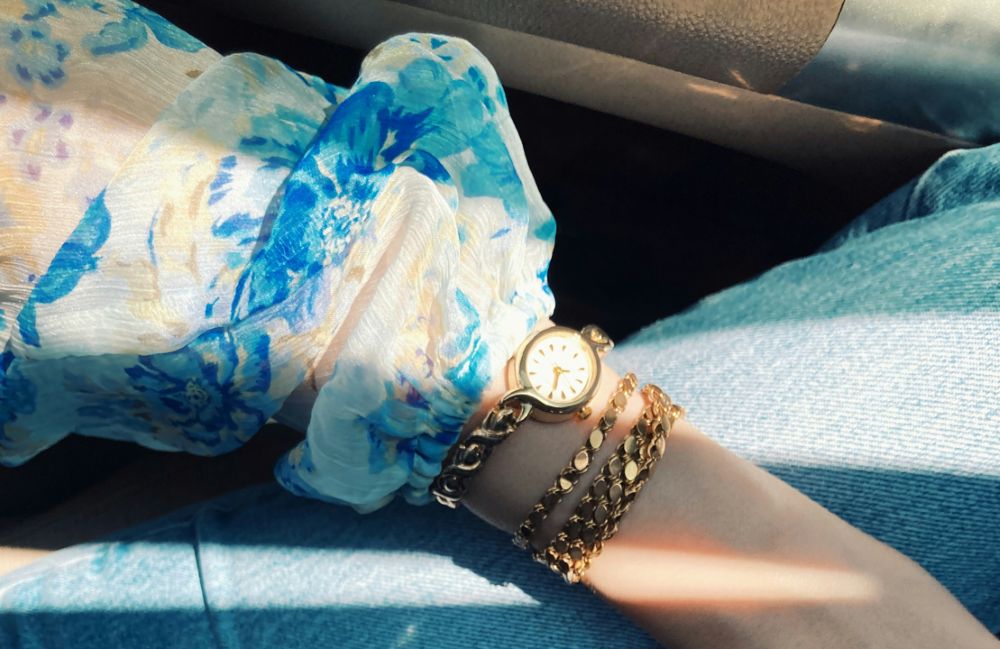 Image of wearing a watch with a long sleeve shirt